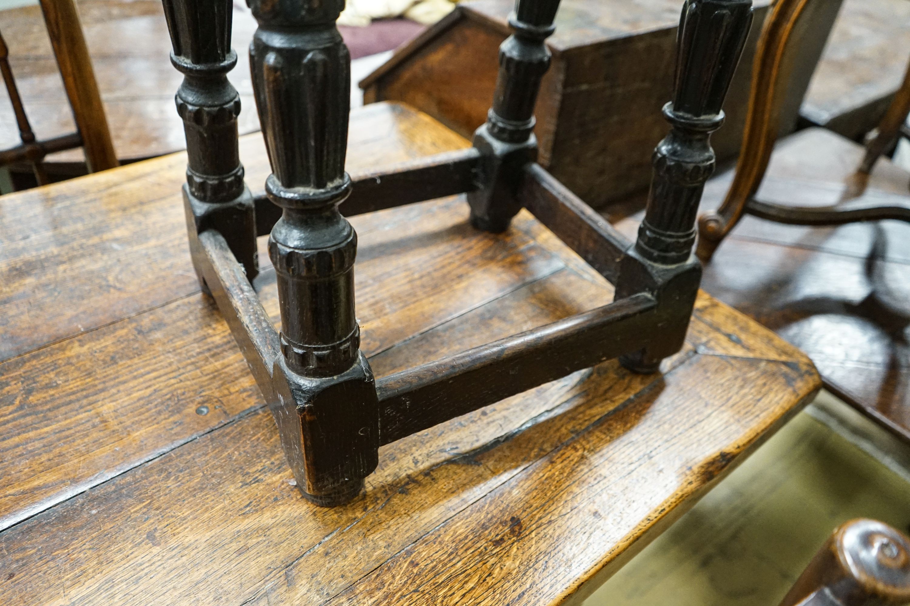 A late 18th century style stained oak joint stool, with turned and fluted legs, width 44cm, depth 28cm, height 56cm